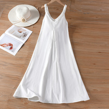 温柔风气质V领白色吊带连衣裙女夏季休闲宽松压褶海边度假风长裙