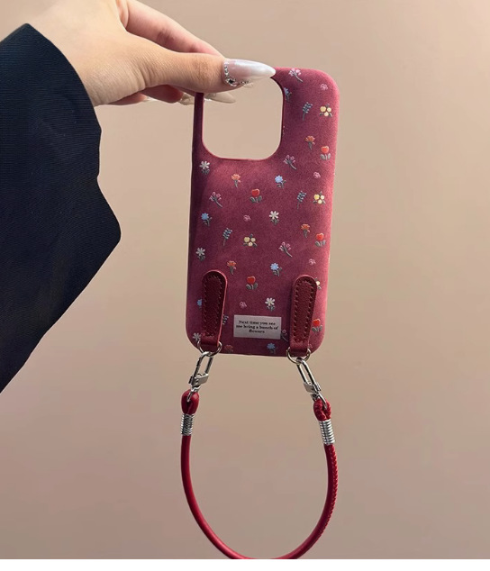 Maillard marrón pequeño floral iphone16promax bolsa de tambor patrón de piel Apple 15pro/14 funda para teléfono móvil aplicable 13