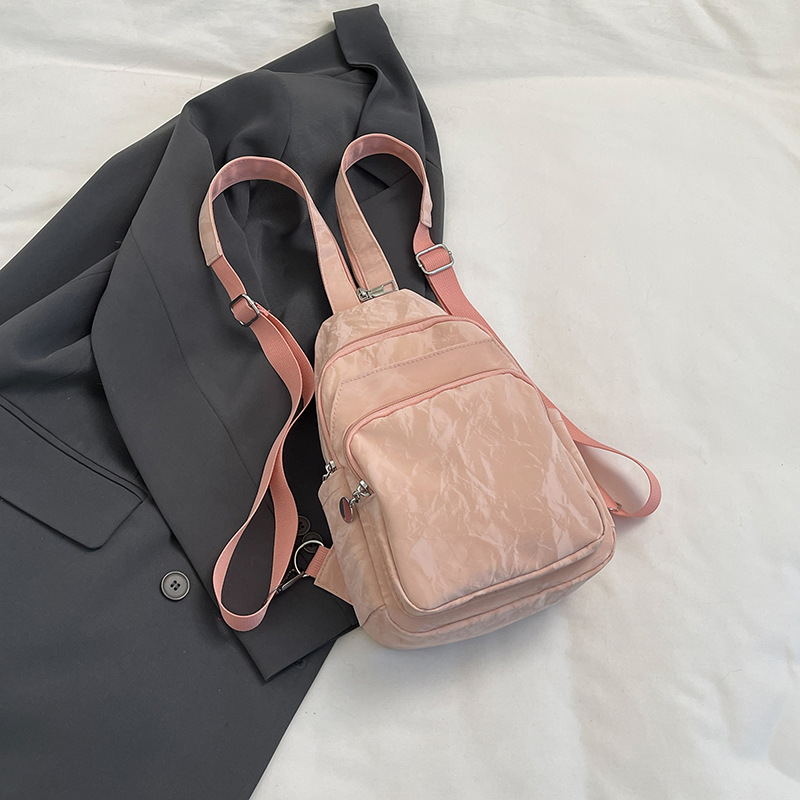 Nuevos productos de cuero suave pu doble uso bolso de pecho de moda de mujer impresión de tendencia nueva mochila china textura mochila pequeña