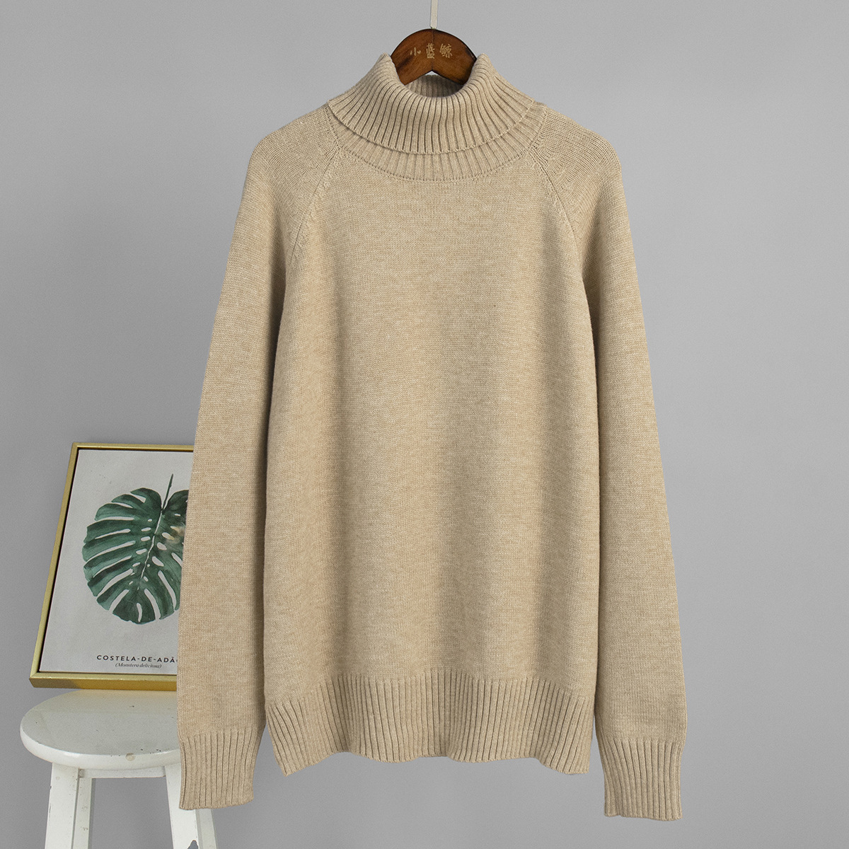 Suéter de cuello alto estilo europeo y americano, otoño-invierno 2025, elegante, versátil, de color liso, con manga raglán, diseño para mujer, longitud media. image 7