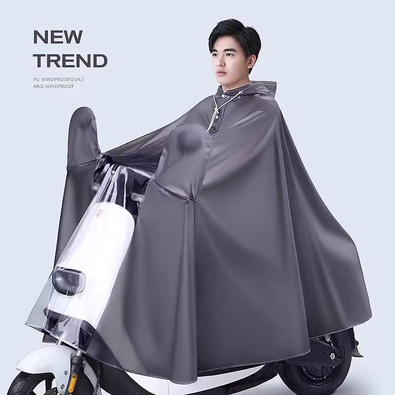 Electric car raincoat riding poncho candy color dashboard double hat brim PVC adult conjoined raincoat rain gear wholesale Electric car raincoat riding poncho candy color dashboard double hat brim PVC adult conjoined raincoat rain gear wholesale