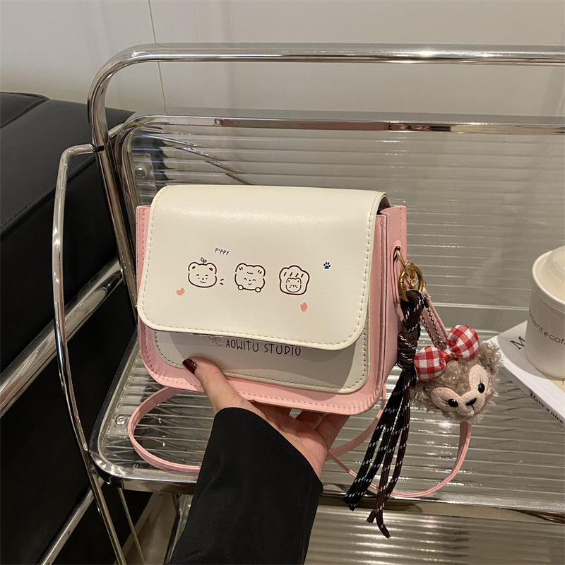 Bolso de mujer de color contrastante 2025 nuevo estilo de estilo de impresión de moda extranjera, bolso de hombro simple, bolso de mochila dulce