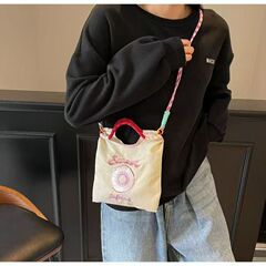 日本イン刺繍ドーナツナイロンバッグ 2025 新しいファッションミニ通勤バッグシングルショルダークロスボディバッグ