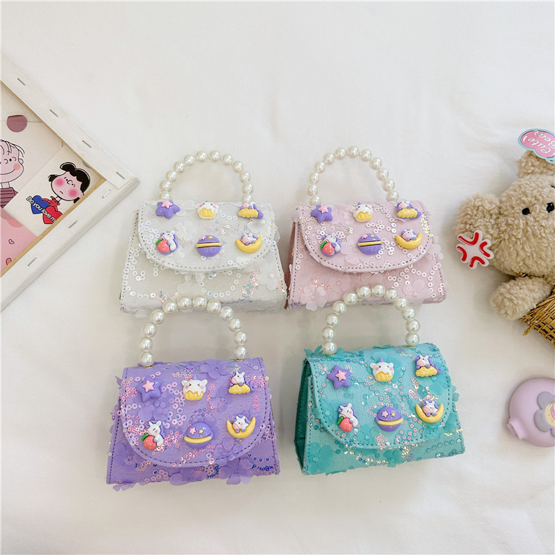 Nueva princesa de dibujos animados bolsos infantiles lindos bolsos de arco de moda chica perla bolsos de hombro