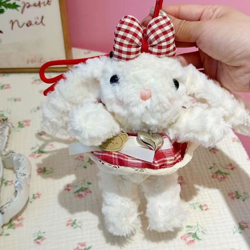 新商品の桜の耳を垂れたウサギのカバンのペンダントのぬいぐるみのキーホルダーはクリスマスプレゼントを飾ります。|undefined