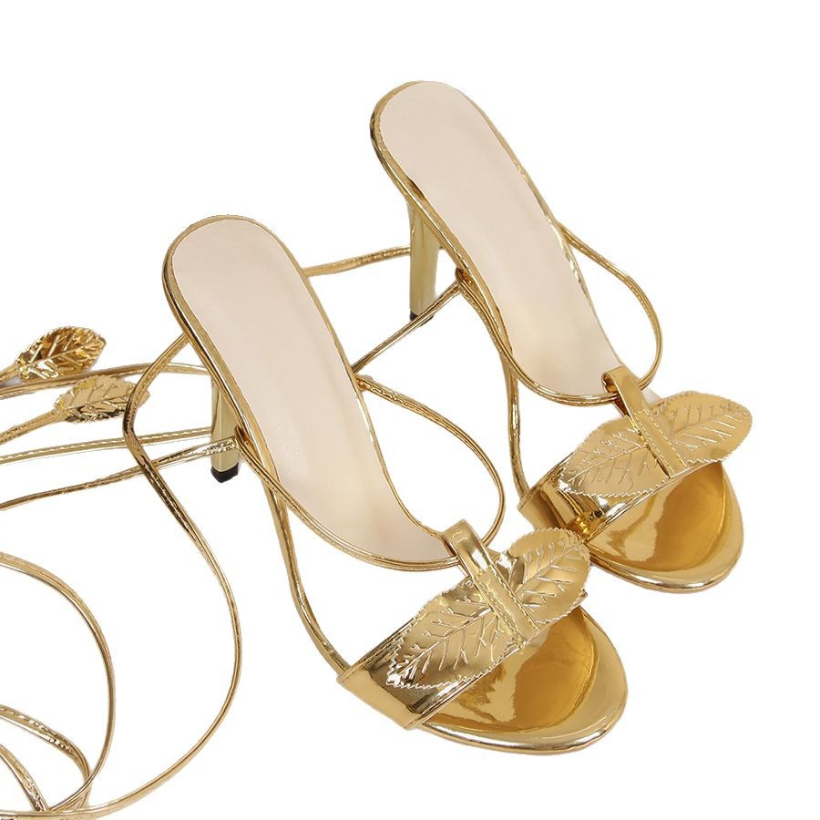 fashionable golden sandals stiletto heels