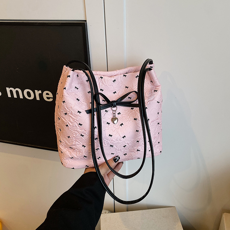 Bolso de axila de moda coreana 2025 verano nuevo bolso femenino lindo lazo bolso de hombro de color de contraste de estilo occidental