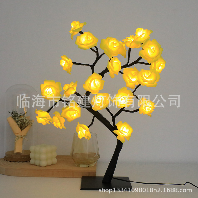 검정색 배경에 노란색 장미 24송이