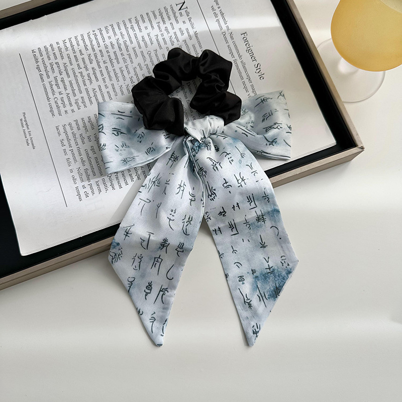 Anillo de cabello de arco femenino retro elegante correa francesa temperamento de alta sensación de impresión de anillo de intestino suave tocado versátil