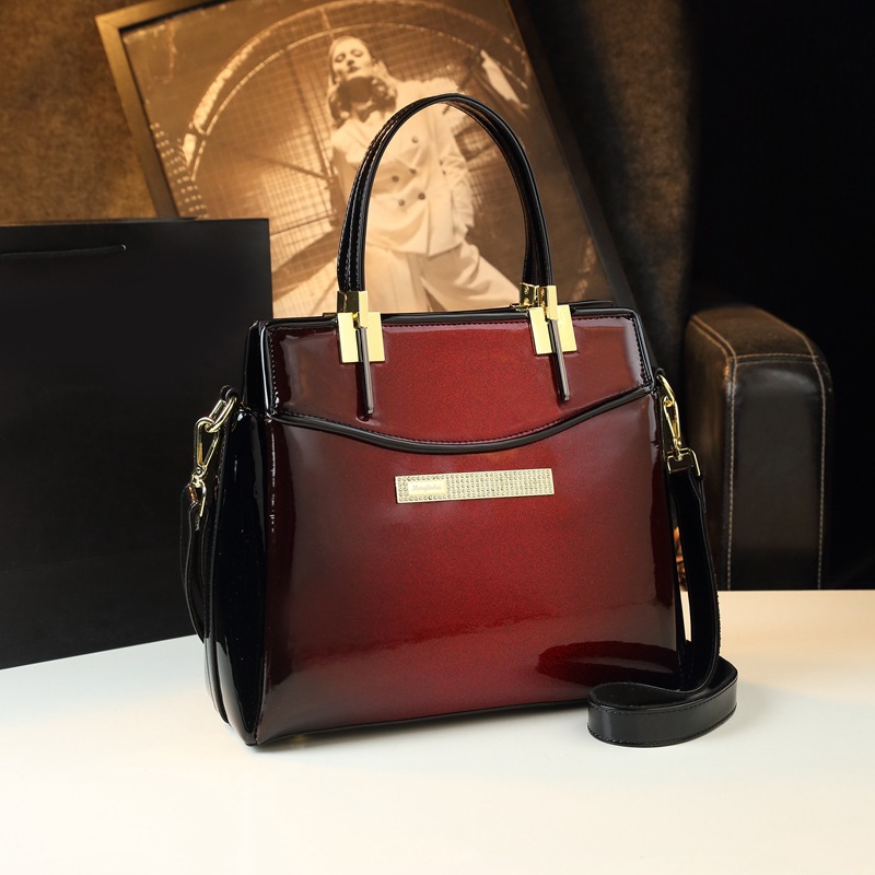 Bolso de mujer de mediana edad, bolso de madre, cuero de moda, bolso grande simple, 2024, nuevo bolso de mensajero portátil de gran capacidad