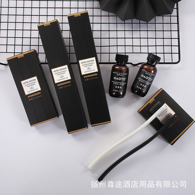 ホテルの洗面用品の卸売り民宿スリッパホテルの柔らかい毛の歯ブラシの使い捨ての歯具のシャンプーの入浴セット