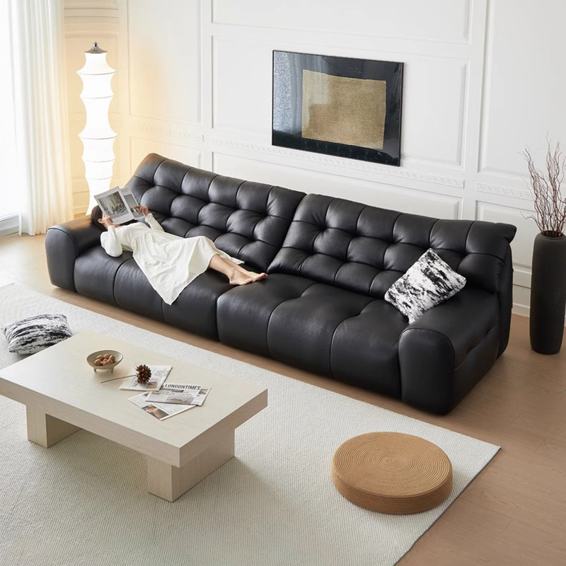 Gran sofá de oso negro capa superior piel de vaca apartamento pequeño sala de estar estilo italiano minimalista estilo antiguo sofá de cuero con respaldo alto negro