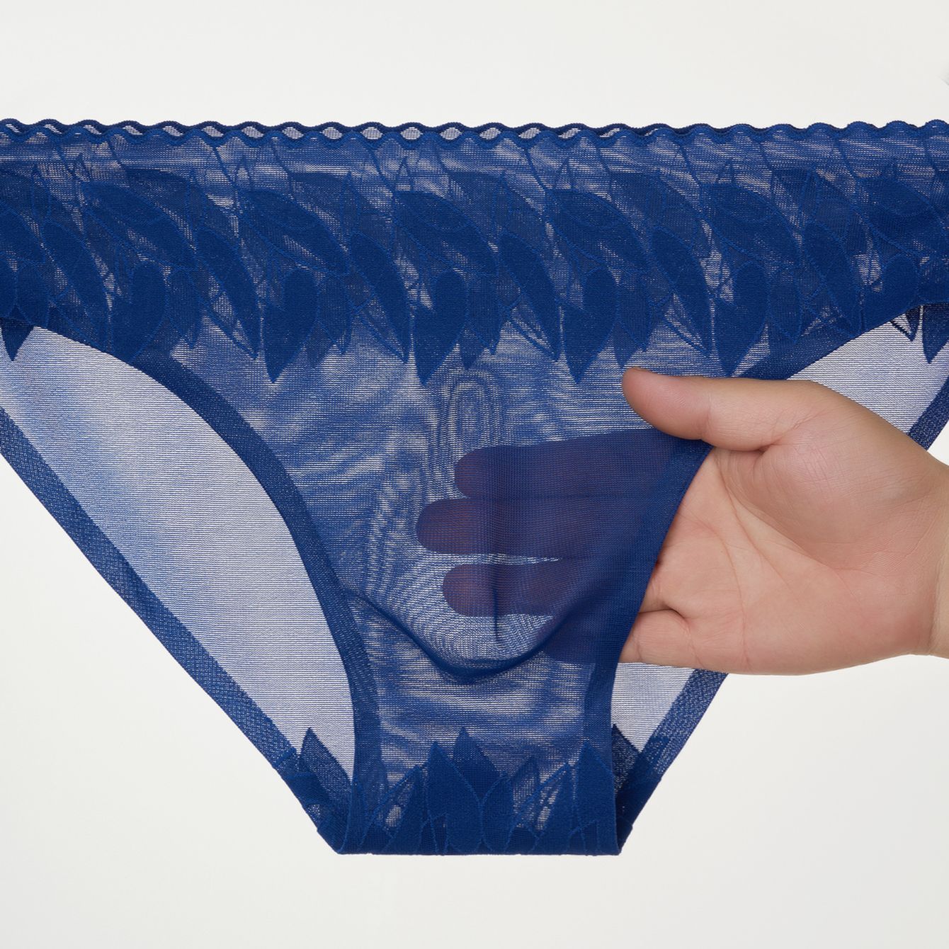 Nuevas calzoncillos de hombre elásticos de encaje 3D bolsas convexas estereoscópicas calzoncillos de hombre sin marcas