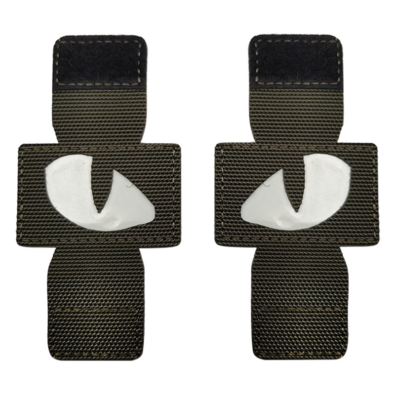 Creativo suministro personalizado gato ojo luminoso moral sello al aire libre militar fan mochila sello pequeño diablo militar MOLLE colgante