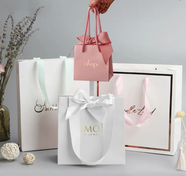 Yisheng Packaging Bag Paper Bag Custom Gift Bag Logo Boutique Gift Paper Bag Designer Luxury Shopping Bag Zero Yisheng Packaging Bag Paper Bag Custom Gift Bag Logo Boutique Gift Paper Bag Designer Luxury Shopping Bag Zero
