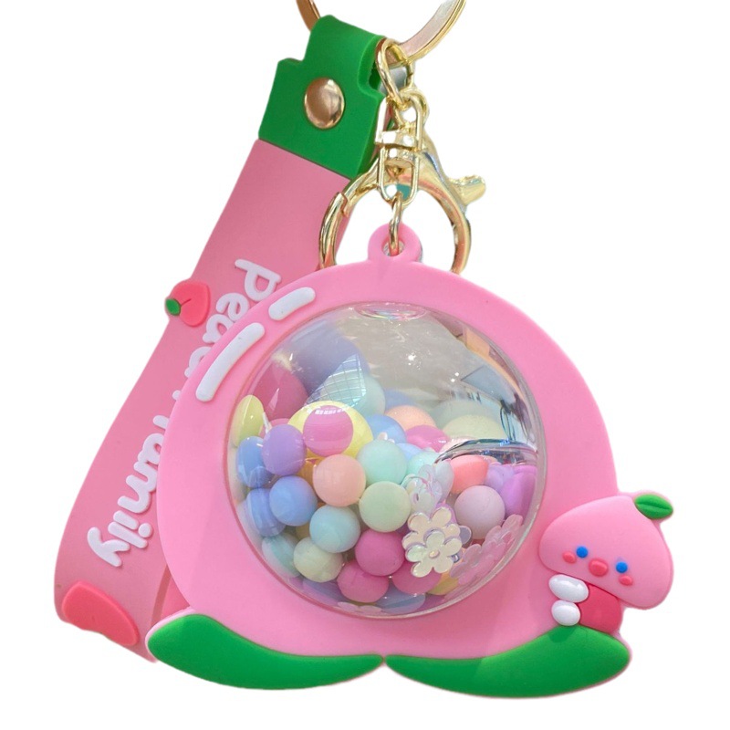 Acrílico lleno de aceite de melocotón llavero pareja bolsa colgante coche llavero lindo pequeño regalo al por mayor