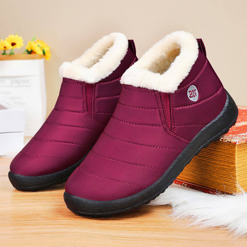 Zapatos de algodón de invierno nuevo poliuretano par de botas de algodón gruesas al aire libre calentamiento botas de nieve botas cortas de comercio exterior