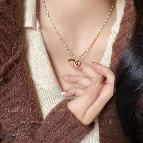 High-end millet tiger eye stone necklace women's autumn and winter retro sweater chain high-end atmospheric long pendant clavicle chain