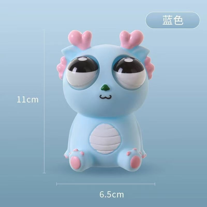 Explosión de ojos dragón pellizco de música juguete de descompresión año del dragón apretón ojo ojo ojo ojo pequeño dragón muñeca ventilación dragón juguete al por mayor