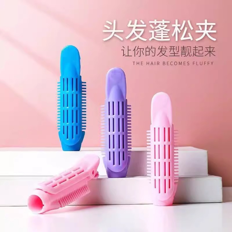 髪の根のふわふわした神器の頭の上で髪を巻きます。|undefined