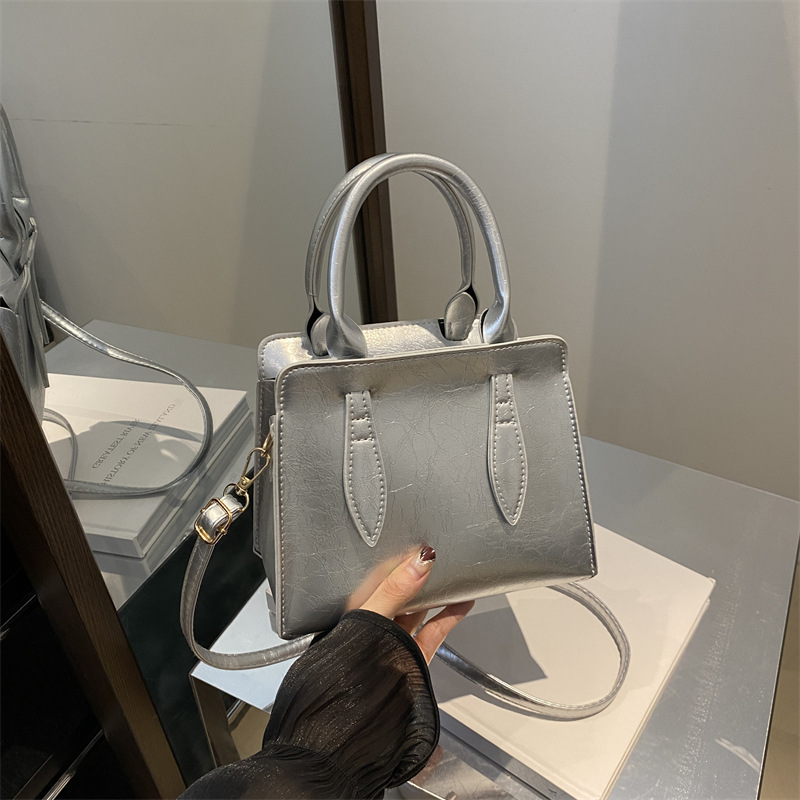 Bolso pequeño retro de alta calidad para mujer 2024 otoño nuevo bolso de mensajero popular bolso cuadrado pequeño Tote portátil