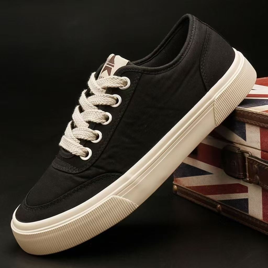 Zapatos de hombre de color sólido zapatos de lona clásicos básicos simples de estilo universal de moda baja zapatos de skate de lazos planos zapatos de mujer