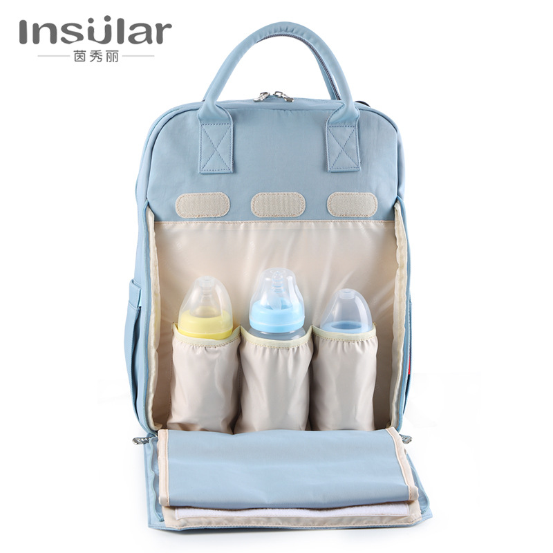 Mochila impermeable de gran capacidad para madres, con compartimento para botellas de aislamiento, ideal para uso exterior y viajes.