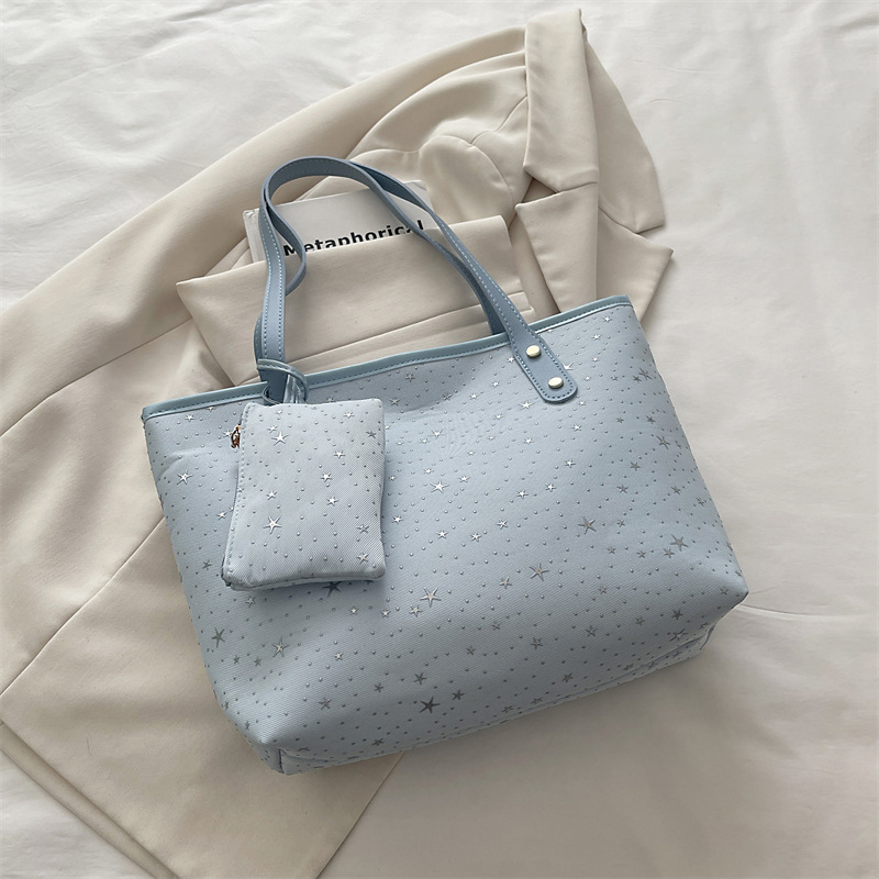 2026 primavera nueva bolsa de hombro de gran capacidad bolsa de brazo universal tendencia transfronteriza dulce viento bolso de mano bolso de mujer