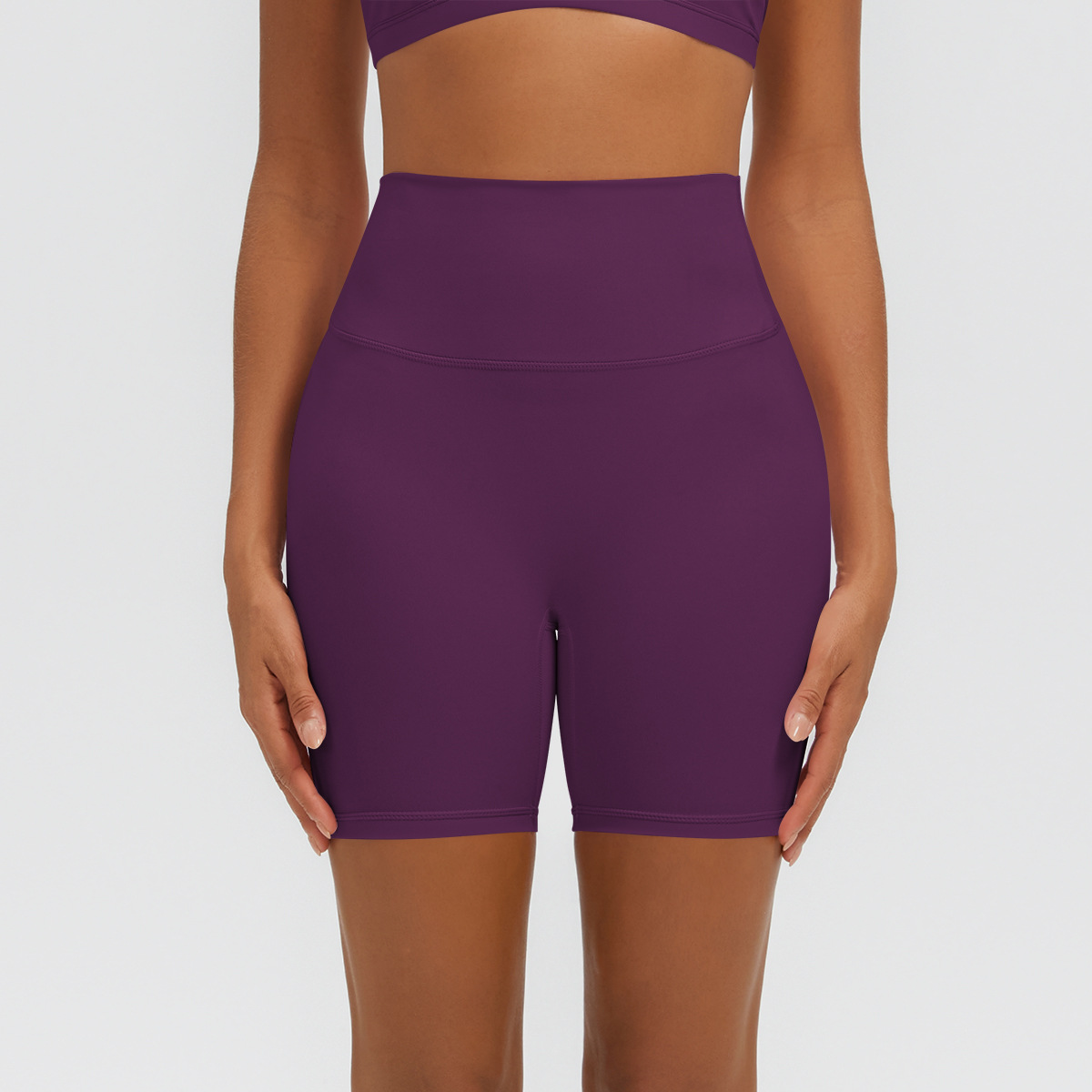Nuevo tipo delgado de hielo, piel transpirable, ajustado, color sólido, ropa de yoga, pantalones cortos de tres puntos.
