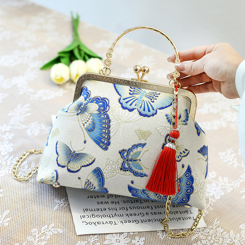 Bolso cruzado de un solo hombro estilo antiguo a juego bolso cheongsam bolso transfronterizo nuevo estilo retro estilo chino bolso portátil de oro de boca terminado