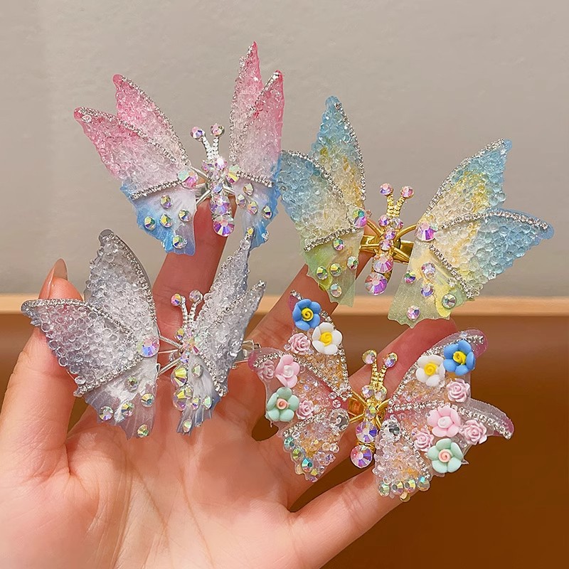 Horquilla de mariposa en movimiento horquilla de diamantes de imitación súper inmortal para niños 2025 nuevo clip de cabello roto lateral de niña accesorios para el cabello