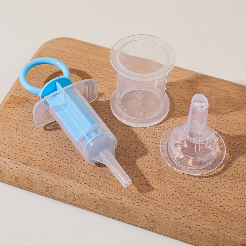 Los fabricantes suministran pezón alimentador de Medicina de silicona bebé chupete cabeza alimentador de medicina infantil anti-estrangulamiento alimentador de agua