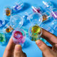 Factory wholesale 32*47mm capsule twist egg toy 2 yuan twist egg ball color crystal twist egg blind box gift