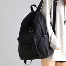 2025新款韩版纯色轻便书包女初中生大学生大容量休闲旅行背包男士