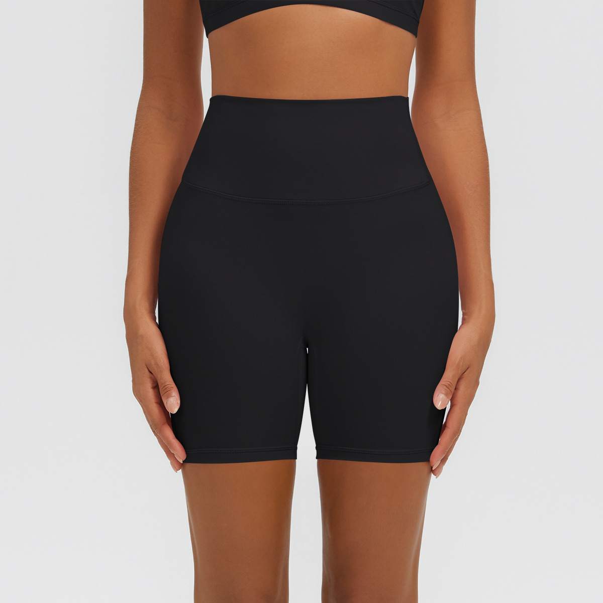 Nuevo tipo delgado de hielo, piel transpirable, ajustado, color sólido, ropa de yoga, pantalones cortos de tres puntos.