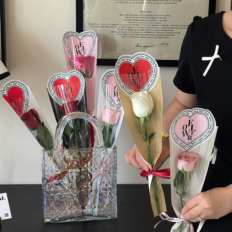 Huaxi día de San Valentín Crohe corazón una sola bolsa integral de papel de embalaje de flores bolsa de cuero transparente material floral