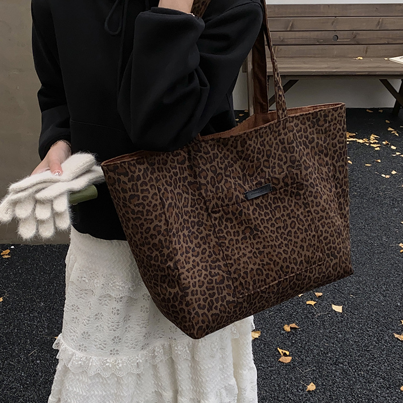 Europa y los Estados Unidos retro leopardo para hombres y mujeres bolsos de hombro bolsos de viaje de gran capacidad bolsos de mano de cacho de invierno niños bolsos de mochila