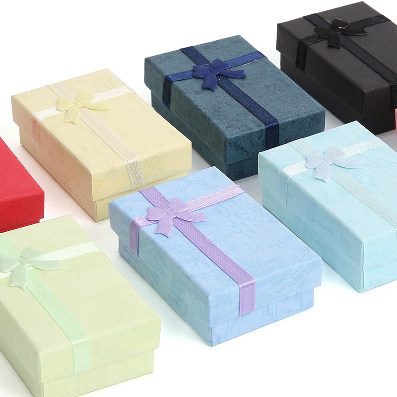 Caja de joyas de la cubierta del cielo y la tierra, serie de papeles de nube, pernos de orejas, taladro de regalo al por mayor, caja de embalaje de joyas de arco de fábrica