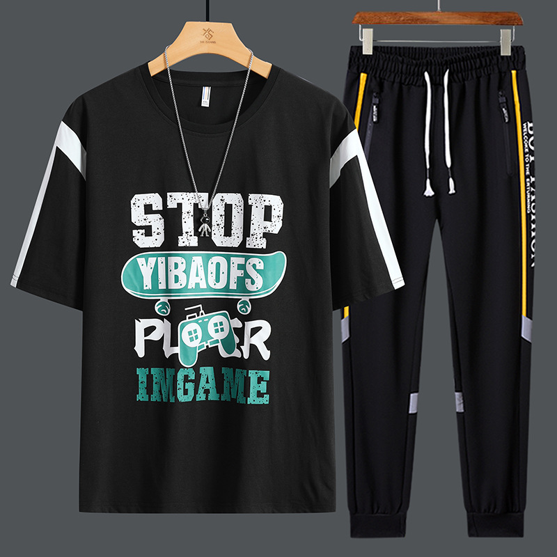 Conjunto de dos piezas de camiseta de cuello redondo holgada y deportiva informal juvenil de moda para el verano 2025 con pantalones y traje de manga corta para hombre