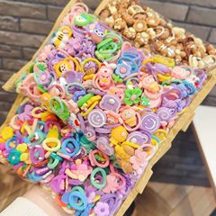 赤ちゃんの小さい指輪の輪のアクセサリの子供の小さい皮の筋の高い弾力性の髪の輪の子供の親指の輪の漫画の髪の縄の卸売り