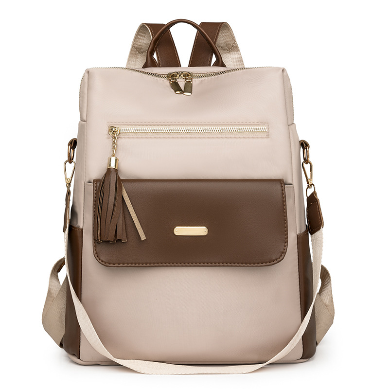 Mochila de tela de nailon nueva transfronteriza para mujer, bolso de viaje de ocio ligero y versátil de gran capacidad, mochila con flecos