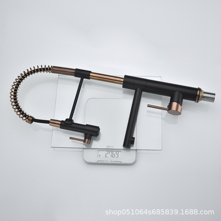 The contemporary all-copper cold and hot single handle island kitchen from Germany features a magnetic sink for washing vegetables, a pull-out flower shower, and a rotatable faucet undefined