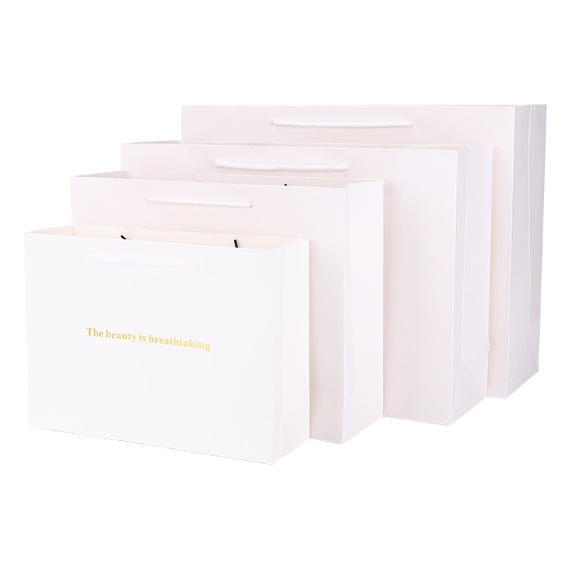 Bolso de embalaje de ropa de cartón blanco bolso puede ser personalizado UV artesanía en stock embalaje bolso de compras bolsa de embalaje