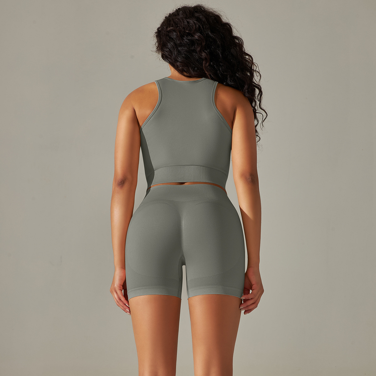 Las mujeres transfronterizas de punto sin costuras chaleco de color sólido pantalones cortos de levantamiento de cadera traje de yoga deportes correr fitness yoga ropa para mujeres