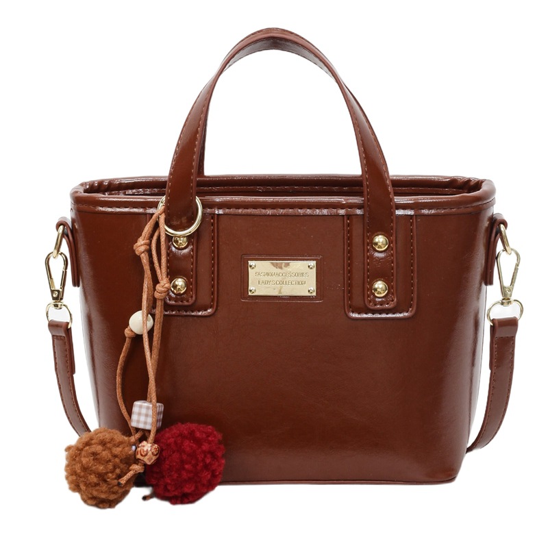 Bolso de moda de alta calidad retro bolso de cubo para mujeres otoño / invierno 2025 nuevo estilo versátil bolso de hombro bolso de mochila coreano