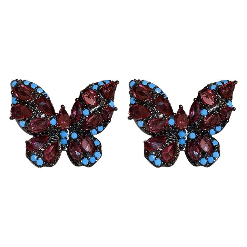 Corea del Sur ins nicho pendientes de alto grado luz pendientes de temperamento de lujo para las mujeres Pendientes de mariposa de circón personalizados retro de aguja de plata