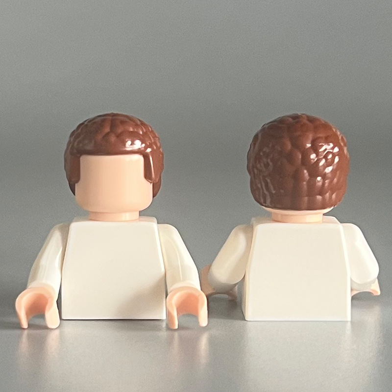 21778 considers herself brown with curly hair