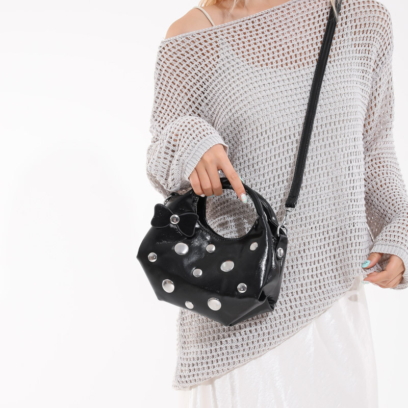 Bolso de alta calidad con textura 2025 verano nuevo bolso femenino moda bowknot bandolera personalidad remache bandolera