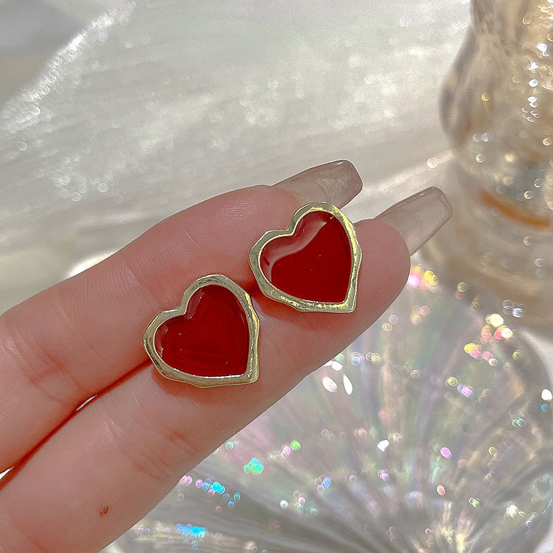 Pendientes de suministro empresarial de puestos de mercado nocturno pendientes al por mayor transfronterizos Pendientes de borla de temperamento de todo fósforo popular Pendientes coreanos