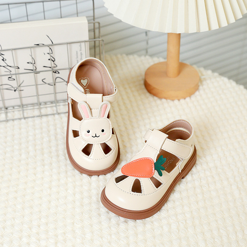 Niñas de dibujos animados conejo Baotou sandalias 2025 verano nuevo estilo niños estilo occidental princesa zapatos de cuero hueco para niñas marea
